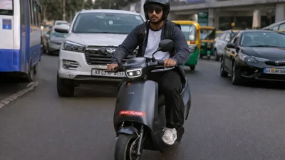 Ola S1 X 2kWh electric scooter riding in daily city commute traffic